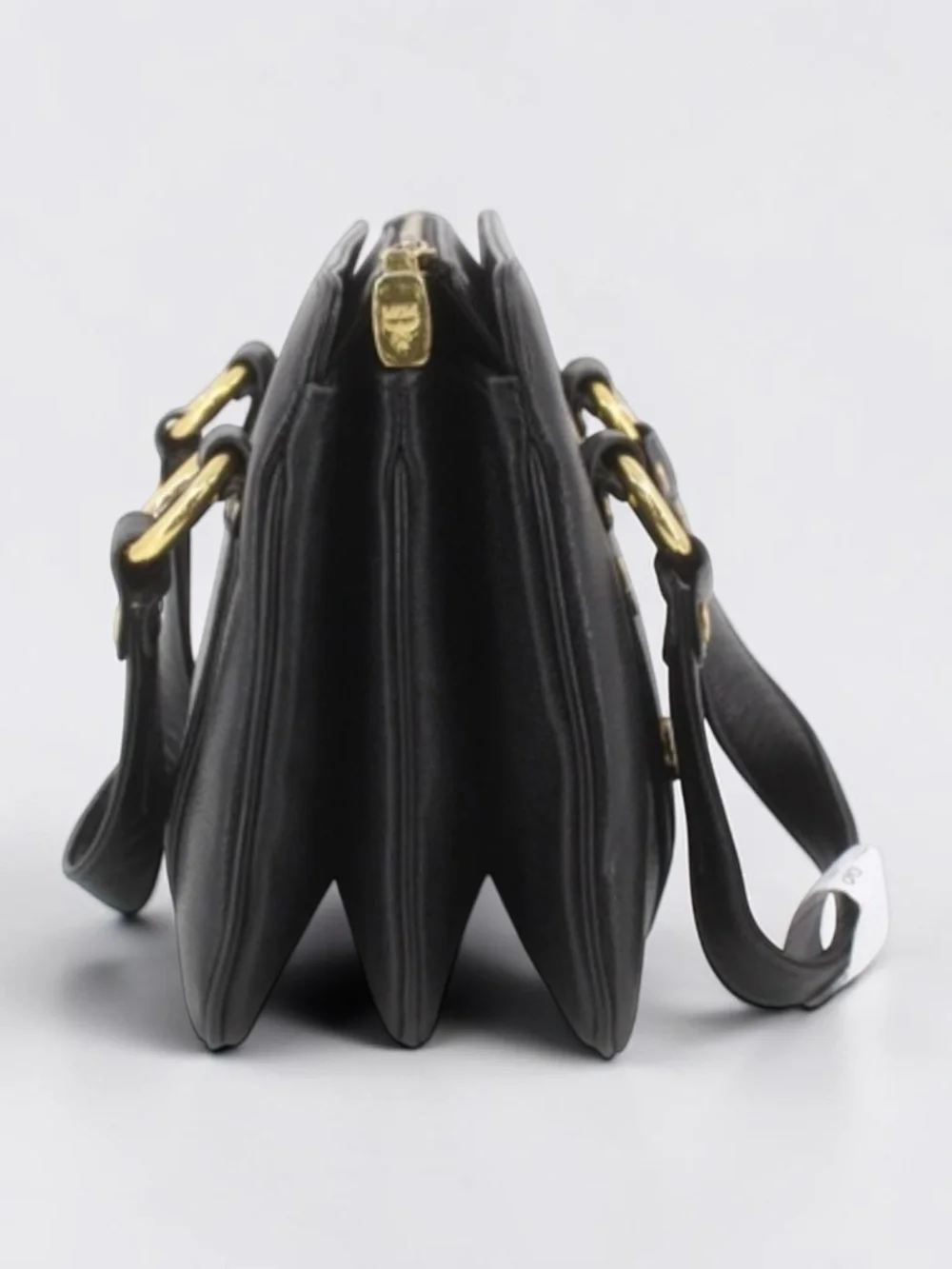 MCM Black Leather Satchel with Gold Hardware Accents